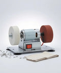Pro Grade Dual Wheel Electric Bench Grinder on base with polishing and grinding wheels for metal fabrication.
