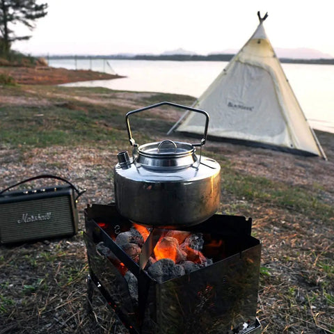 One Liter Lightweight Stainless Steel Camping Kettle Built Tough For Bushcraft And Outdoor Campfire Use on campfire