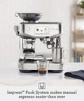 Barista Touch Impress Espresso Machine With Real Time Guidance And Silky Microfoam Turbo 3 Second ThermoJet Heat Up Impress Puck System For Home Barista Quality Brews In Brushed Stainless Steel BES881BSS on countertop