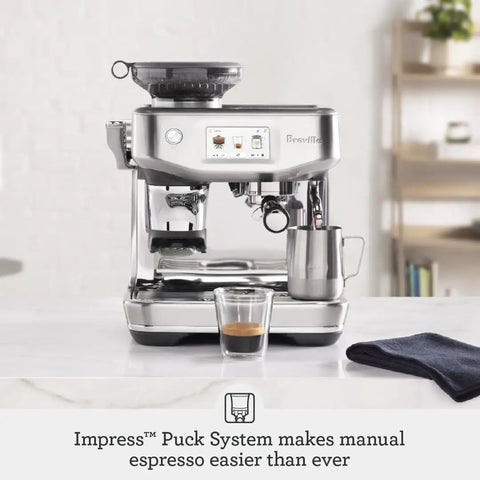 Barista Touch Impress Espresso Machine With Real Time Guidance And Silky Microfoam Turbo 3 Second ThermoJet Heat Up Impress Puck System For Home Barista Quality Brews In Brushed Stainless Steel BES881BSS on countertop