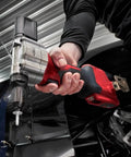 Killer Grade Cordless Rivet Tool Fits Milwaukee M12 12V Systems in hand, applying metal fasteners with precision.