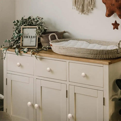 Heavy Duty Zinc Alloy Cabinet Knobs And Pulls Feel Dang Solid Antique Cream Copper Finish on a stylish sideboard.
