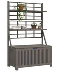 Badass Acacia Wood Outdoor Storage Chest With Built In Garden Trellis And Four Deep Compartments For Yard Gear Plus Patio Deck Essentials Tough As Nails Grey Wash Finish with shelves and potted plants.