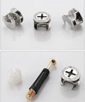 Three pieces of zinc cam locks and a nylon insert nut from the One Hundred Pack Heavy Duty Furniture Connector Kit.