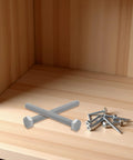 Four Pack M10x10mm Stainless Steel Hex Head Bolts with Lock Nuts, Flat Washers, and Lock Washers Fully Threaded on Wood Surface