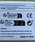 Manufacturer and warning instructions on paper for fragile items, noting recycling and proper handling in English and French.