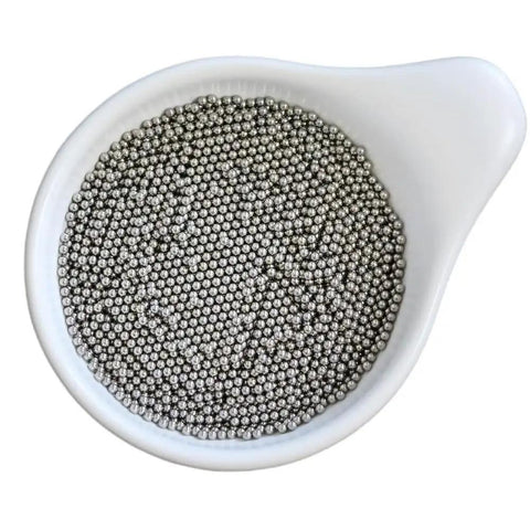 Bulletproof 15 Lb Pack 1/16 Inch 304 Stainless Steel Bearing Balls in a bowl, precision machined metal spheres for smooth turning.