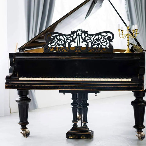 Smooth Rolling Vintage Brass Plate Casters With Reliable Locking Brakes For Heavy Duty Furniture Chairs Rock Solid Construction Easy Swap Setup Top Shelf Quality Cabinet Wheels Upgrade on a grand piano.