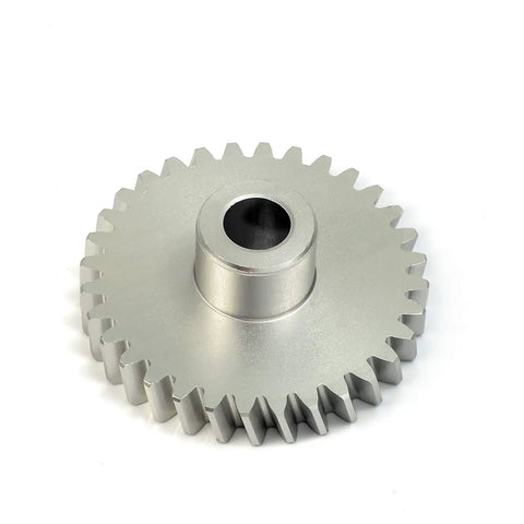 Hella Badass Billet Aluminum Water Pump Upgrade Kit With Impeller Gear Shaft Bearing Oil Seal And Gasket Constructed Like A Tank For Banshee 350 Quad Bosses gear with teeth and central hole.
