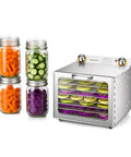 Badass Electric Food Dehydrator With Clear Tempered Glass Door And Stackable Stainless Steel Trays with jars of vegetables.