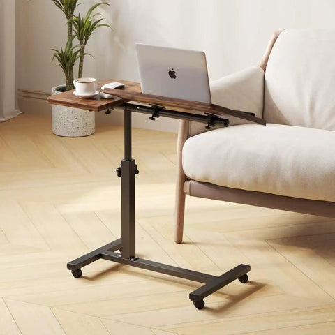 Adjustable Overbed Table With C Shape Design Portable Rolling Desk For Bedside Couch And Living Room Height Adjustable Pivot Desktop Brown Finish Multi Function Tray Table next to a couch