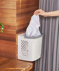 Person using Removable Laundry Basket With Sturdy Storage Rack On Wheels White Household Organizer For Laundry And Home Storage