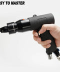 Adjustable Speed Pneumatic Rivet Nut Gun Kit With Five Mandrels Heavy Duty Air Riveting Tool in hand, showcasing ergonomic grip.