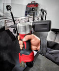Beefy Cordless Rivet Tool For 12 Volt Power Batteries pulling steel fasteners with ease in a workshop setting.