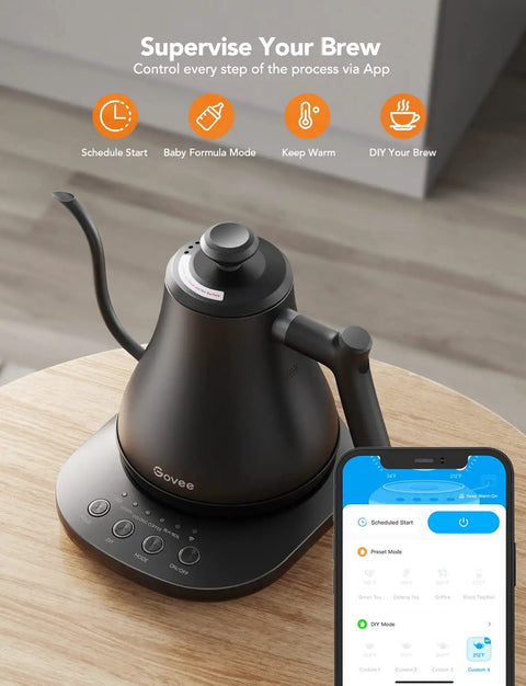 Smart Electric Kettle With WiFi And Alexa Control For Home Baristas Gooseneck Pour Over Kettle With Variable Temperature 1200W Quick Heat 0.8L Capacity One Hundred Percent Stainless Steel Matte Black on a wooden table with smartphone app display.