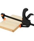 Eight Inch Quick Grip Clamps Four Pack Adjustable Wood Clamps for Woodworking Bar Clamps holding wooden boards in place