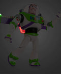 Totally Tubular Buzz Lightyear Interactive Talking Action Figure Featuring Eleven Authentic Voice Lines And Rad Wing Deployment With Pulsing Laser Beam For Next Level Playtime Fun, showcasing wings and lights.