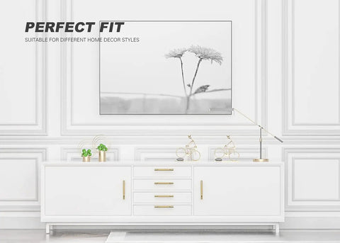 White cabinet with Solid Brass Cabinet Pulls 4 Pack 3 3/4 Inch Brushed Gold Modern Drawer Handles For Kitchen Cabinets Dressers Wardrobes 96mm Hole Centers Heavy Duty Durable Solid Construction, under a framed flower artwork