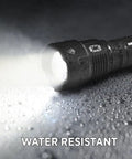 High Powered LED Flashlight S1200 mid size zoomable beam water resistant handheld light for camping, outdoor adventures, showing water resistance