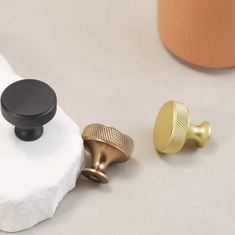 10 Pack Brushed Brass Kitchen Cabinet Knobs With Knurled Texture Gold Drawer Knobs displayed with a bronze and black knob set
