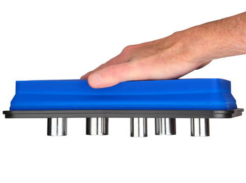 Side view of a hand collapsing one of the trays in the Magnetic Parts Tray Set With Three Collapsible Sizes For Mechanics, blue color