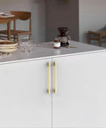 Top Shelf Brushed Gold Cabinet Pulls And Drawer Handles Built From Heavy Duty Zinc Alloy Measuring 10 Inch Center To Center on white cabinet.