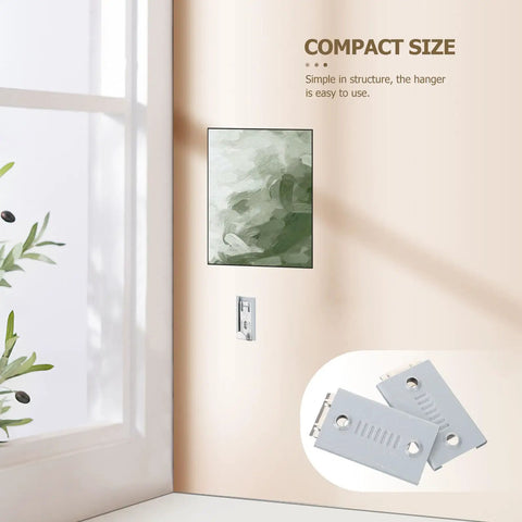 Heavy Duty Stainless Steel Picture Hangers Built Tough Wall Mount Brackets for Mirrors and Artwork Four Pack displayed with a painting, close-up view.