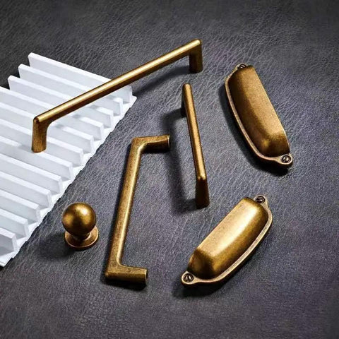 15 Pack 3 Inch Antique Brass Cup Pulls For Kitchen Drawers Solid Zinc Alloy Vintage Retro Hardware, various styles displayed.