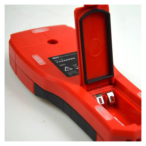 Close-up of Badass Multifunctional Stud Finder Wall Scanner and Electrical Pipe Detector with battery compartment visible.