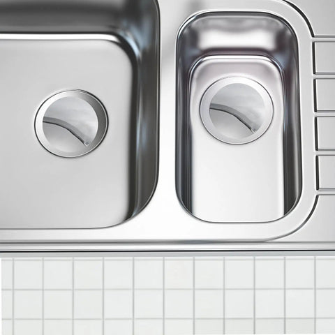 Bathtub Plug Replacement Copper Round Slotted Push Button Waste in stainless steel sink drain showing dual openings.