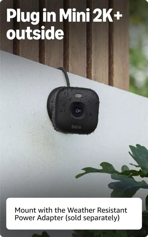 Mini 2K Plus Plug In Indoor Security Camera For Home And Pets With 2K Video mounted outside on wall