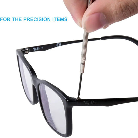 Using Six Piece Mini Precision Screwdriver Set With Phillips Sizes 0 And 1 And Flathead Sizes 1.4mm 2.0mm 2.4mm And 3.0mm Portable Repair Kit on glasses