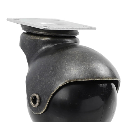 Up Your Game With These Old School Antique Brass Furniture Casters That Roll Like Butter Heavy Duty Swivel Caster Wheels For Cabinets Chairs Tables Vintage Iron Base Replacement Parts Built Tough close-up of heavy-duty swivel caster wheel with black finish and metallic base.