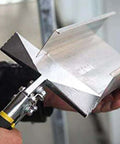 Using 6 Inch Hand Seamer For Sheet Metal With One Quarter Inch Depth Markings Straight Jaw Bender Pliers on metal sheet
