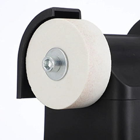 Close-up view of the coarse aluminum oxide wheel on the Compact Mini Bench Grinder, ideal for tool edge sharpening.