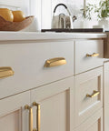 Kitchen view with Stature Champagne Bronze Cabinet Pull 5-1/16 Inch Center-To-Center Drawer Handle for cabinets and furniture installed