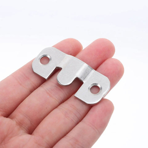 Heavy Duty Stainless Steel French Cleat Picture Frame Brackets 8 Pack With Mounting Screws for display, held in hand.