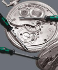 Kraftform Micro 2069 Nutspinner Electronics Precision Screwdriver with 5.5mm head in watch repair showcasing ergonomic handle and blade.