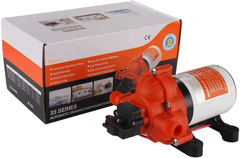 Industrial Water Pressure Pump With Wall Plug 115V AC 3.3 GPM 45 PSI Self Priming Up To 6 Feet Built In Adjustable Pressure UL 778 CSA Certified Easy Plug In Power Connection placed beside its packaging box.