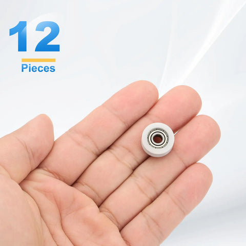 Heavy Duty Nylon U Groove Roller Bearings 4X15X6MM Pack shown in hand, features chrome core and nylon shell for sliding projects.