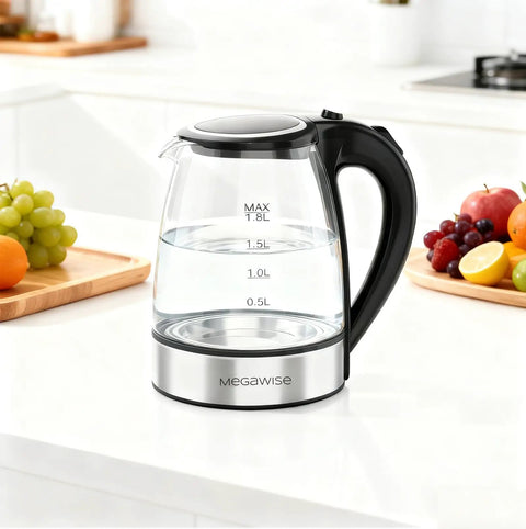 Electric Glass Kettle With Auto Shut Off 1.8L Borosilicate Glass Body Stainless Steel Inner Lid And Base on kitchen countertop.