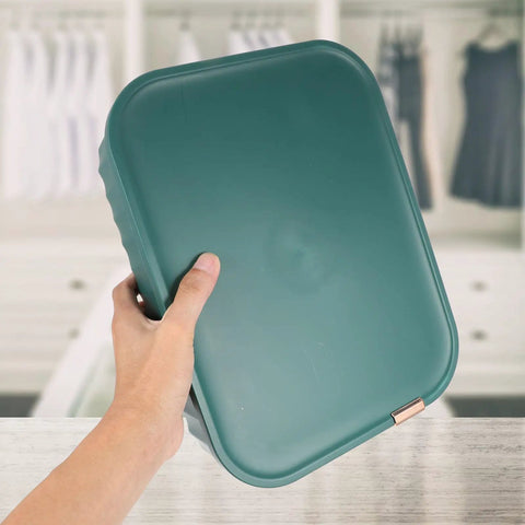 Slick Multi Compartment Heavy Duty Plastic Drawer Storage Container With Secure Top displayed in hand, ideal for organizing socks and undies.