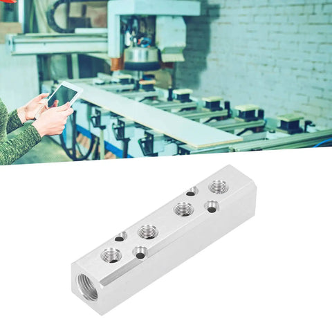 Heavy Duty Aluminum Pneumatic Manifold Block With G1/2 Inlet And G1/4 Outlet in factory setting, splitter style.