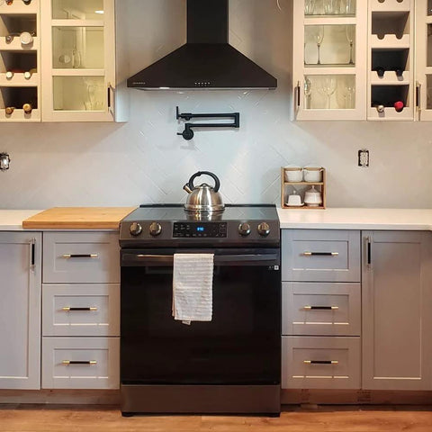 Modern kitchen with Gold And Black Knurled 5 Inch Center Bar Cabinet Pulls Set Of 10 Aluminum Handles on white cabinetry.