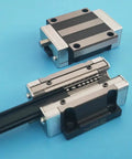 Badass HGW15CA Linear Slider Bearing Double Row Flange Block All Steel High Temperature Resistant Smooth Operation Upgrade For CNC Routers And Shop Machinery 2 Pack on blue background.