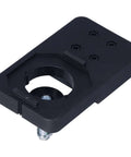 Angled view of black plastic hinge boring jig base with circular drill guide and metal bolt.