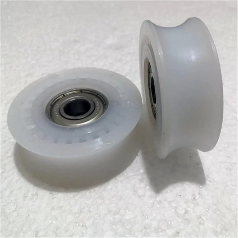 Heavy Built Tough Automatic Sliding Glass Door Roller Kit featuring silent polyurethane wheels on a light surface.