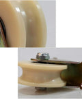 Close-up of Rock Solid Heavy Duty Nylon Roller Pulleys, 5 inch, with sealed steel bearings and metal mounting, designed for wire rope rails.