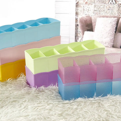 Stackable Plastic Drawer Organizers In Snazzy Pink For Crushing Closet Clutter And Laid Back Home Storage Setup with various colors.