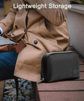 Road Ready Everyday Carry Tech Organizer Bag For Cable Cords And Charger Gear Hard Shell Case with secure elastic sleeves on a bench.